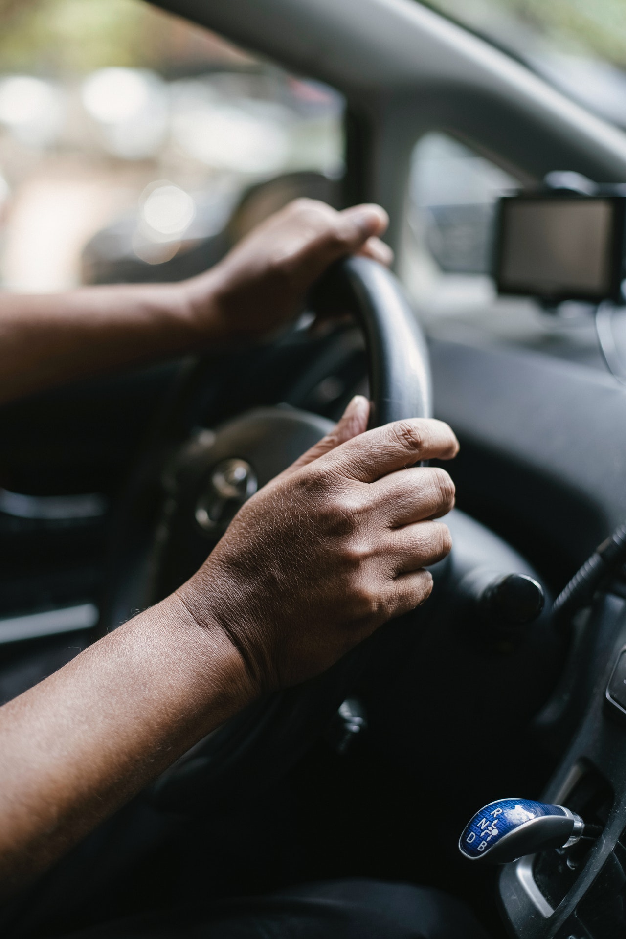 driver steering a wheel